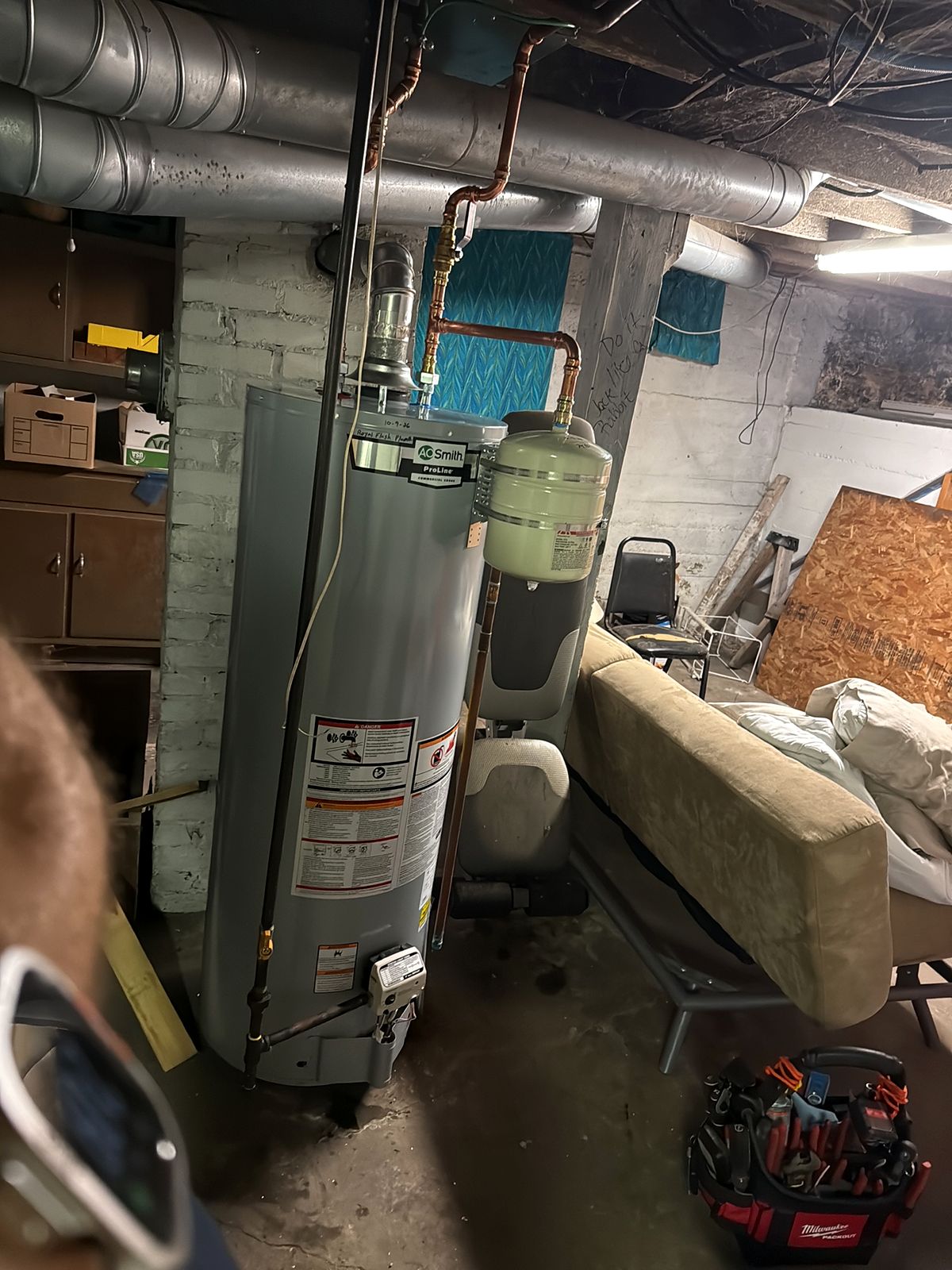 Water heater with new copper and venting in a basement
